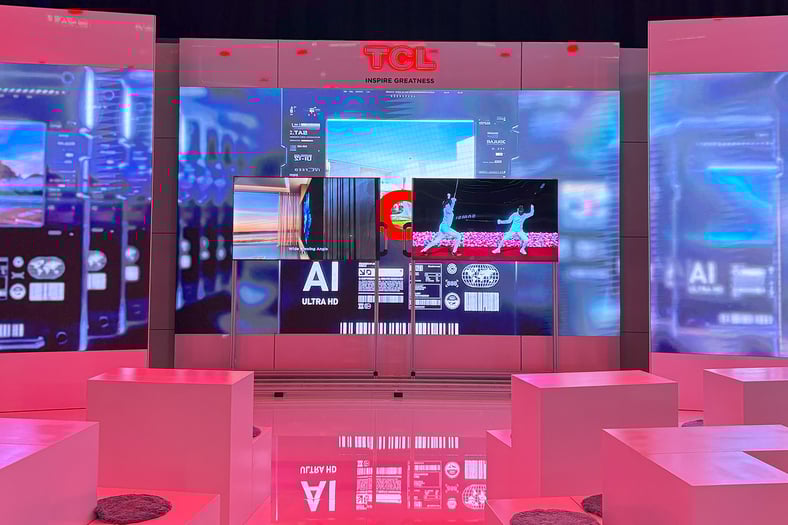 Celebrated trade show booth with movable TVs