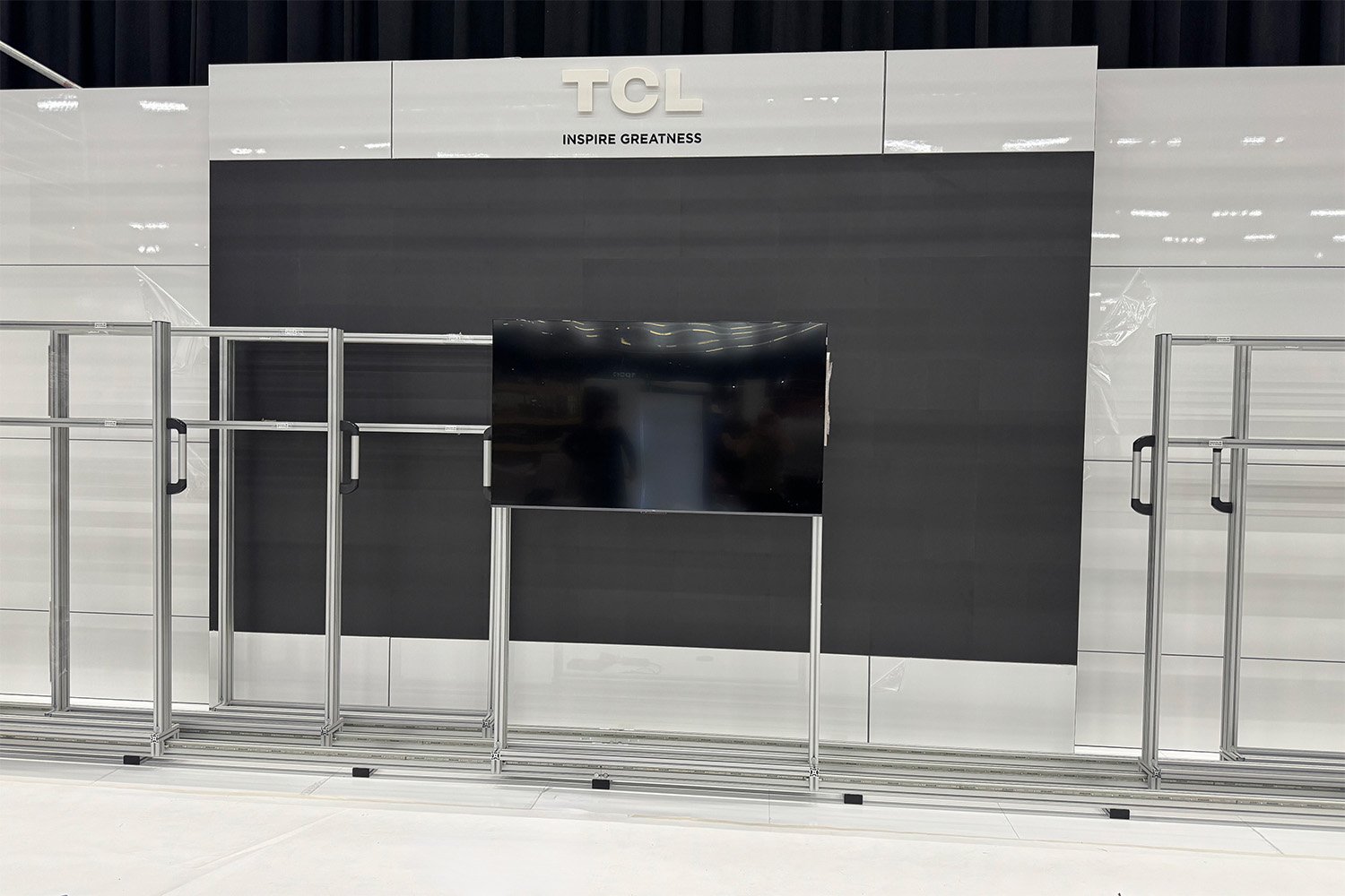 Celebrated trade show booth with movable TVs
